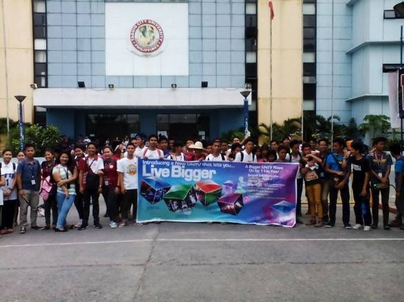 Bread members and other youth organizations from Taguig City University pose for a picture with a UNTV 11th Anniversary banner after the clean-up drive session. Photo Courtesy: Bread Society International